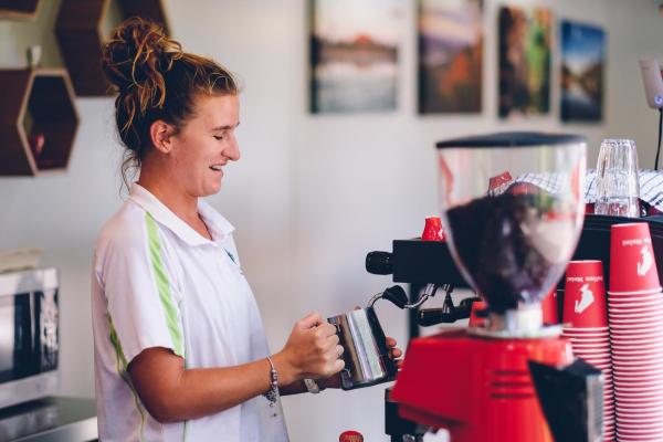 Barista at Spilled the Beans Coffee Shop 